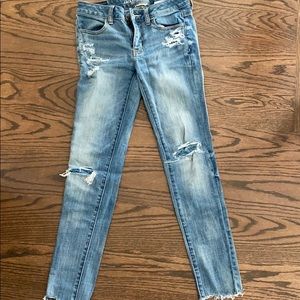 Ripped jeans with patches